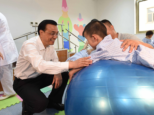 這三年，總理牽掛的殘疾人群體，迎來哪些暖政？