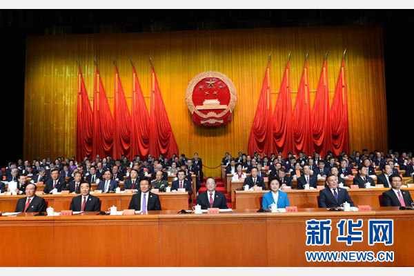 10月1日，慶祝中華人民共和國成立66周年暨新疆維吾爾自治區(qū)成立60周年大會在新疆人民會堂隆重舉行。 新華社記者 饒愛民 攝