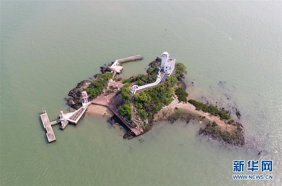 (新華全媒頭條·圖文互動)(2)守望——記舢舨洲“島主”黃燦明一門四代航標工