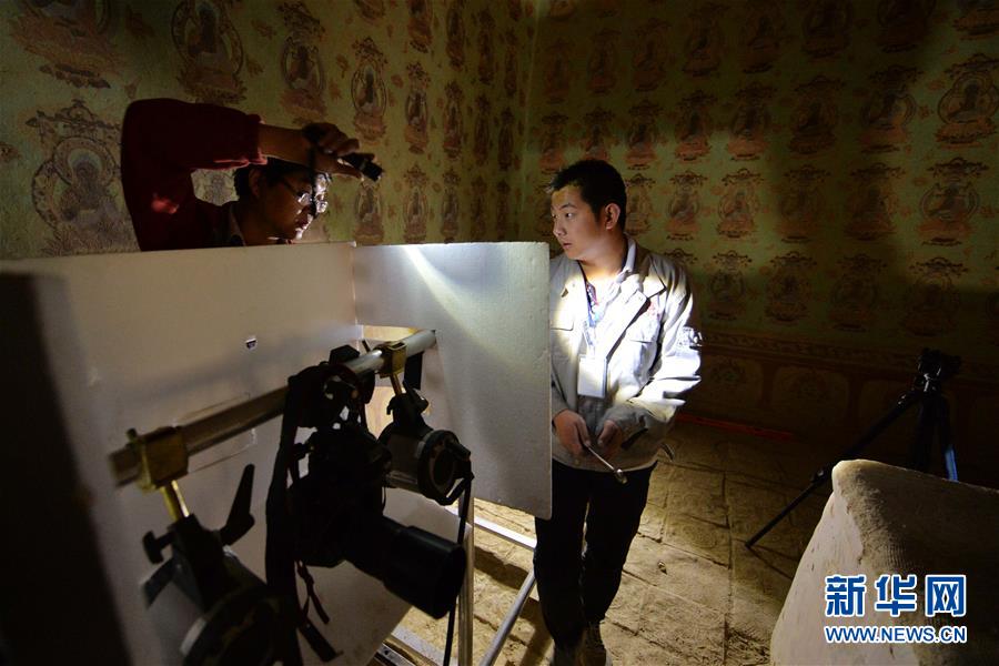 (時(shí)代先鋒·圖文互動(dòng))(16)此生不悔入沙海 勇?lián)厝问家?jiàn)金——敦煌研究院文物保護(hù)利用群體群像