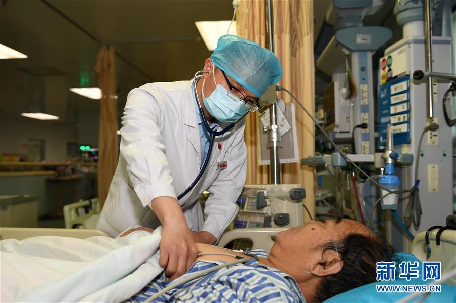 (一線抗疫群英譜·圖文互動(dòng))(7)張正良:“我們完成了自己的使命”