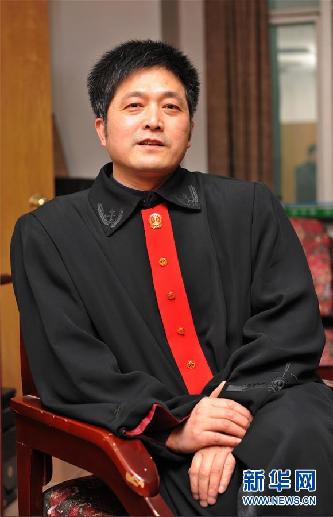 （圖文互動）其人如蘭，既潔且馨&mdash;&mdash;追記&ldquo;全國模范法官&rdquo;胡國運