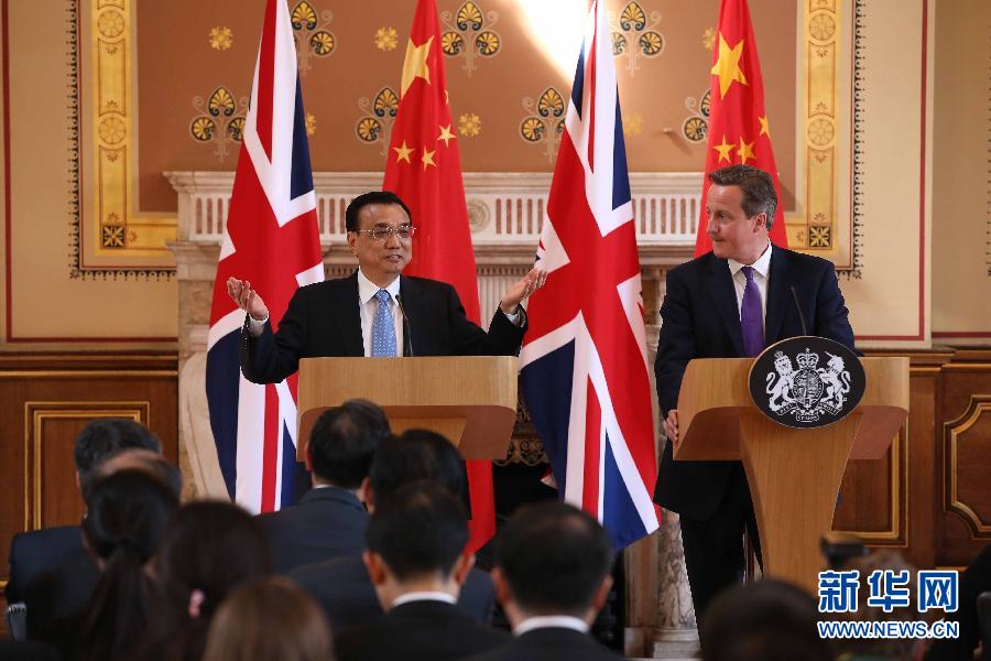 6月17日，國務院總理李克強同英國首相卡梅倫在倫敦舉行中英總理年度會晤后共同會見記者。新華社記者 龐興雷 攝