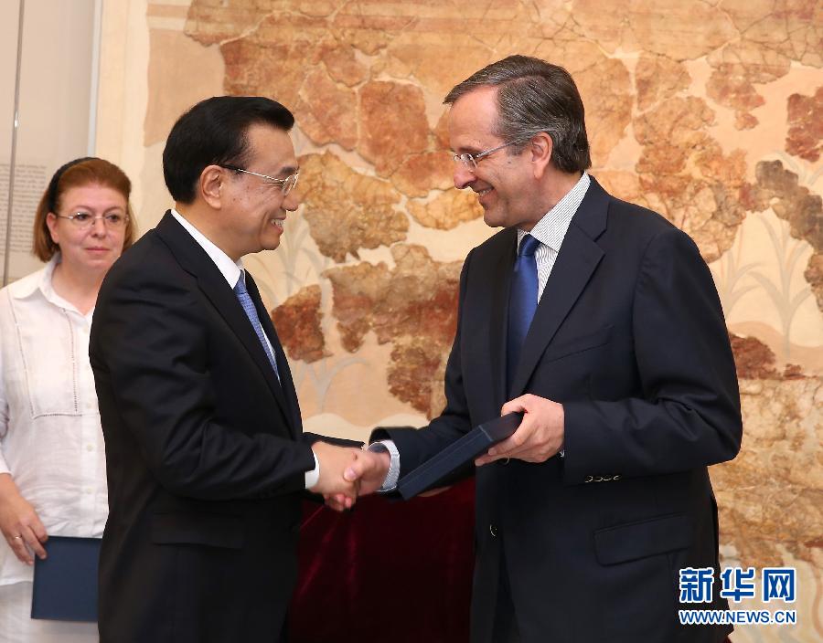 6月21日，國(guó)務(wù)院總理李克強(qiáng)與希臘總理薩馬拉斯共同出席希臘伊拉克利翁博物館新館開館儀式并發(fā)表講話。 新華社記者 龐興雷 攝