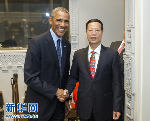 9月23日，國家主席習(xí)近平特使、國務(wù)院副總理張高麗在紐約會見出席聯(lián)合國氣候峰會的美國總統(tǒng)奧巴馬。 新華社記者王曄攝