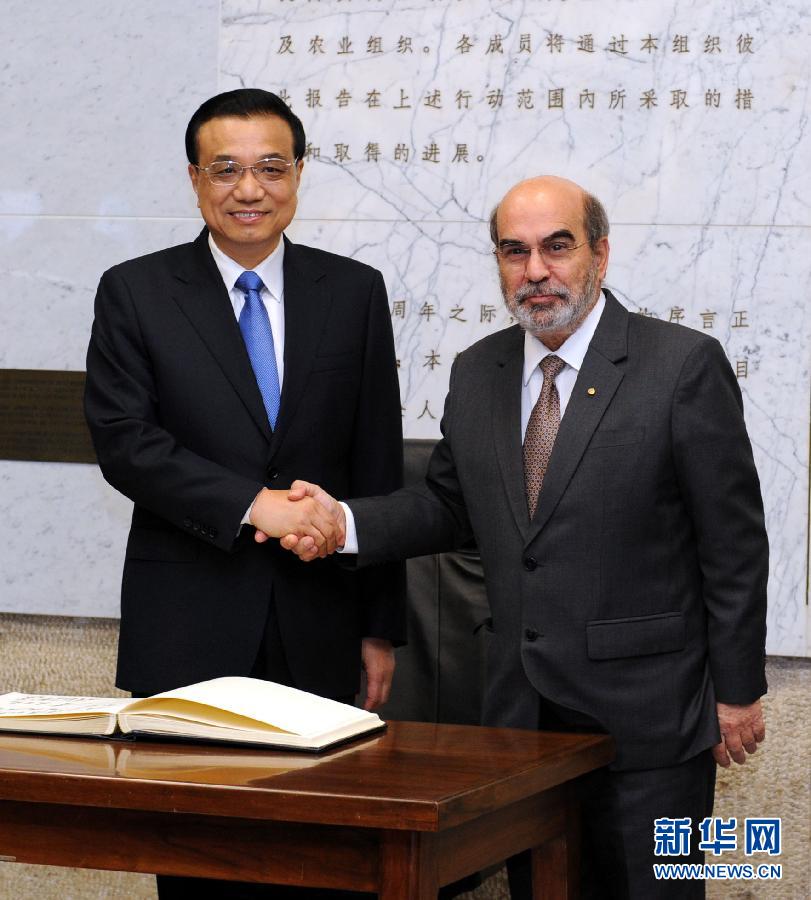 10月15日，中國國務院總理李克強在羅馬會見聯(lián)合國糧農(nóng)組織總干事格拉齊亞諾。 新華社記者 饒愛民 攝