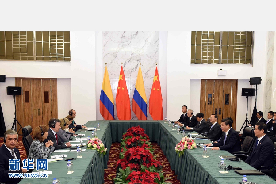 11月18日，國家主席習(xí)近平在菲律賓馬尼拉會見哥倫比亞總統(tǒng)桑托斯。 新華社記者 饒愛民 攝