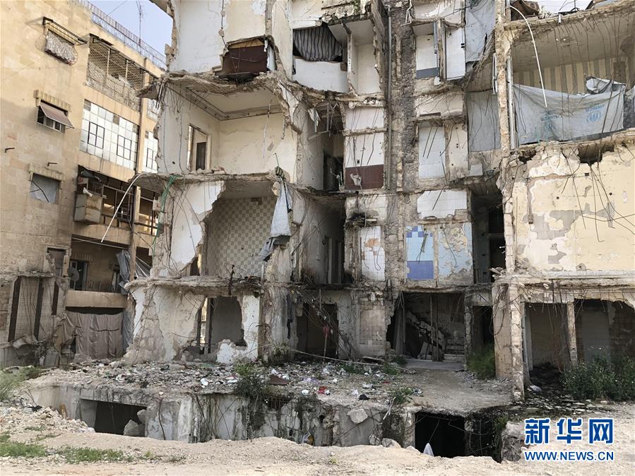 （國際&middot;圖文互動）（7）上學(xué)夢何處安放&mdash;&mdash;敘利亞女孩阿明娜的危樓生活