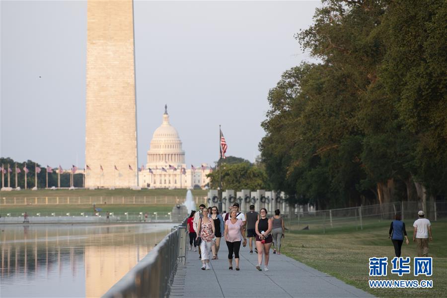 (國(guó)際疫情·XHDW)(3)美國(guó)官方單日新增新冠病例超5.4萬例