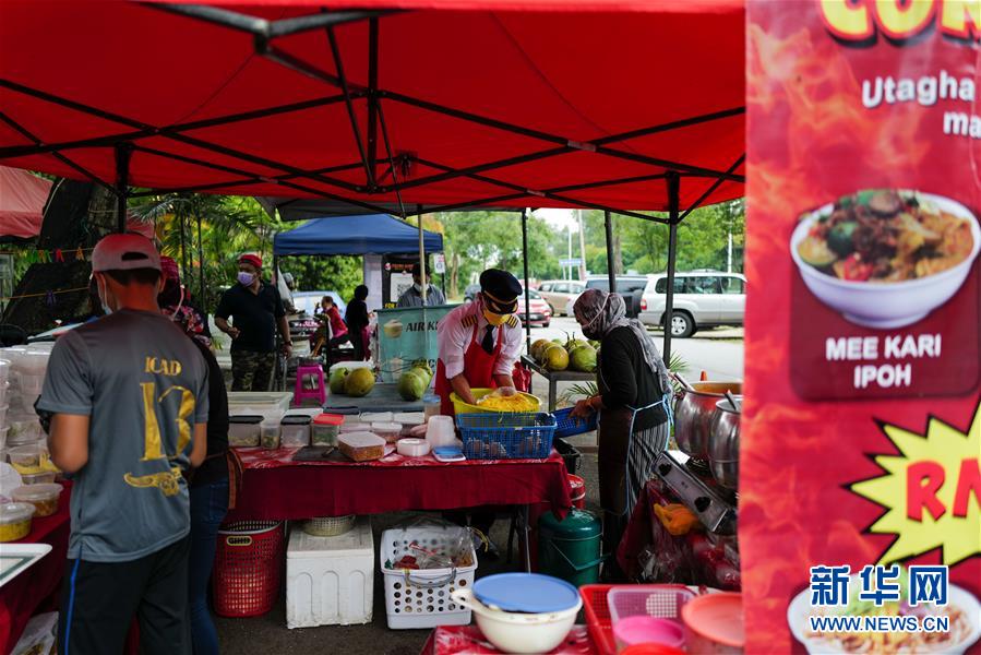 （國(guó)際&middot;圖文互動(dòng)）（5）通訊：前方總有機(jī)遇&mdash;&mdash;記馬來(lái)西亞一位飛行員疫情下擺攤再就業(yè)